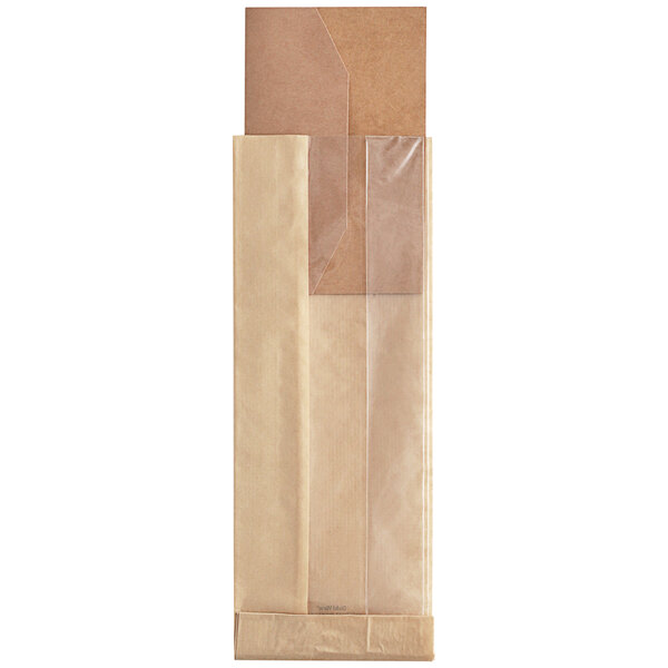 A close-up of a Bagcraft Kraft paper bag with a window.