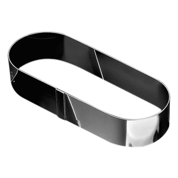 A black oval shaped metal food mold with a silver edge.