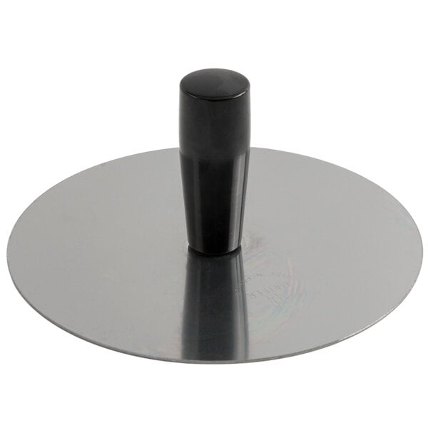 A Matfer Bourgeat stainless steel circular mold pack down tool with a black handle.