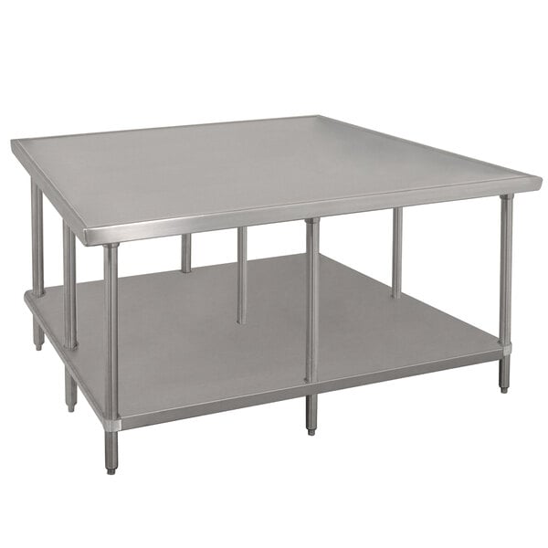 An Advance Tabco stainless steel work table with undershelf.