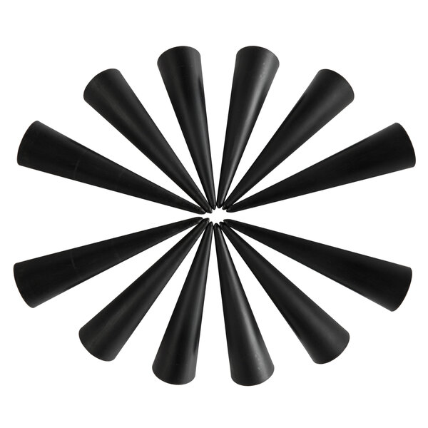 A circle of black plastic Matfer Bourgeat cream horn molds.