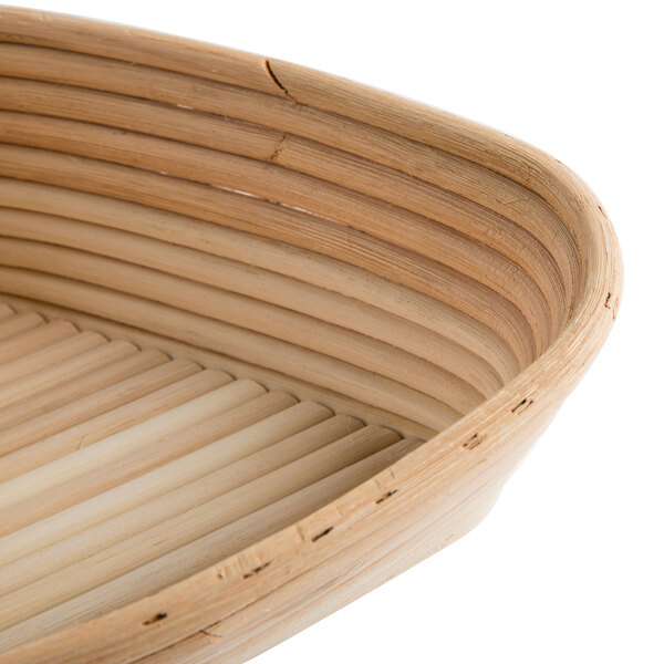 A close up of a Matfer Bourgeat willow triangle proofing basket.