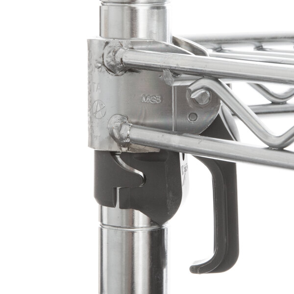 A Metro stationary wire shelving unit with metal shelves and poles.