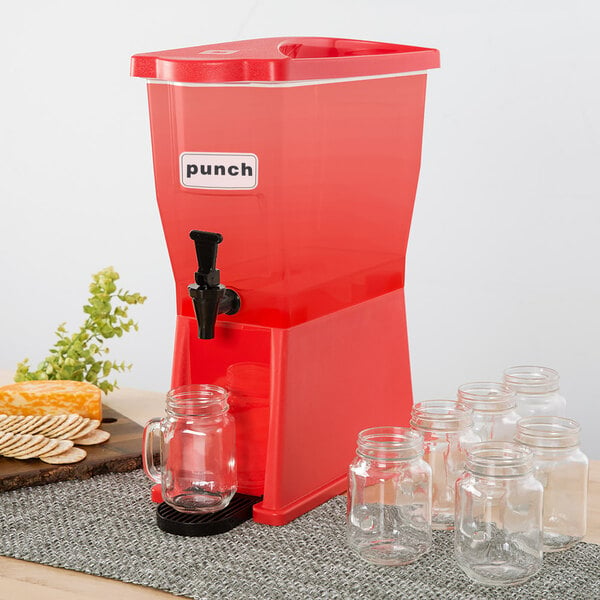 Choice beverage dispenser labels on a table with clear glass jars.