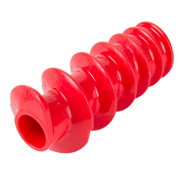 A close-up of a red spiral-shaped object with a hole.