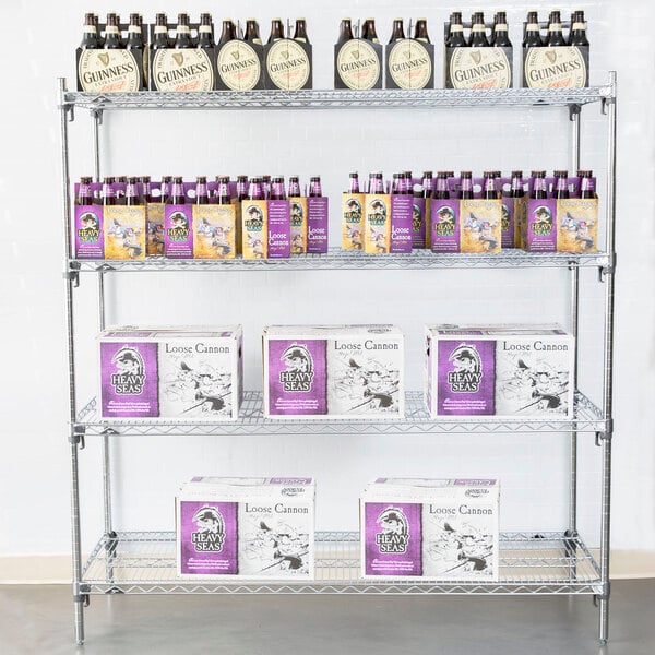 A Metro stationary wire shelving unit with boxes and bottles on a shelf.