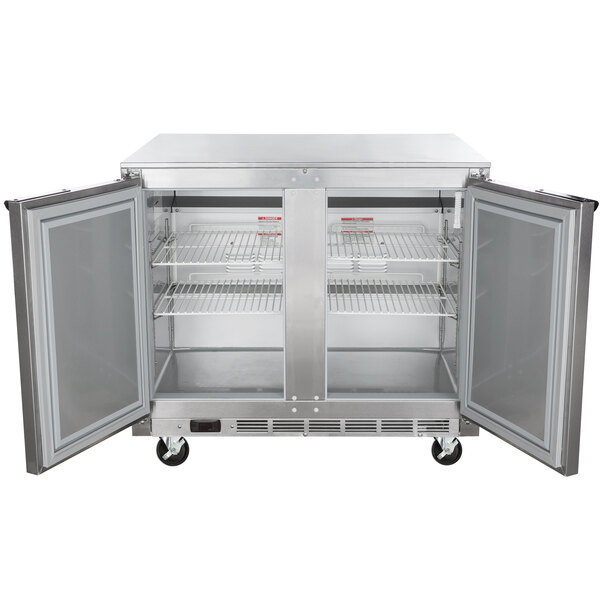 A stainless steel Beverage-Air undercounter refrigerator with two doors open.