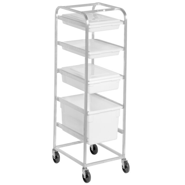 A Channel mobile aluminum food box rack with 15 white plastic bins on it.