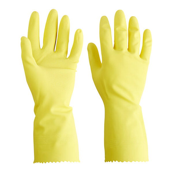 A close-up of a pair of yellow Cordova rubber gloves with a finger up.
