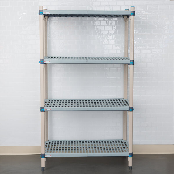 A MetroMax Q shelving unit with three shelves in a room.