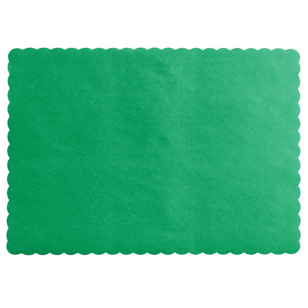 A green paper placemat with scalloped edges.