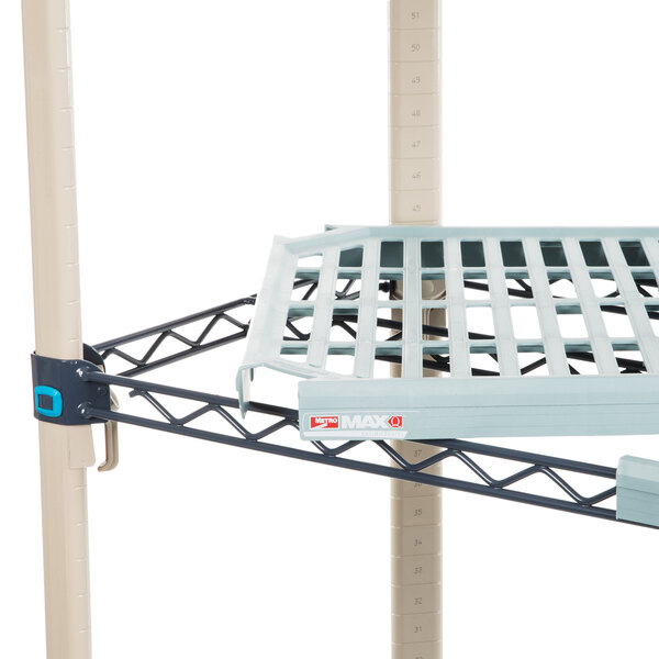 A MetroMax shelving unit with metal shelves and a metal frame.