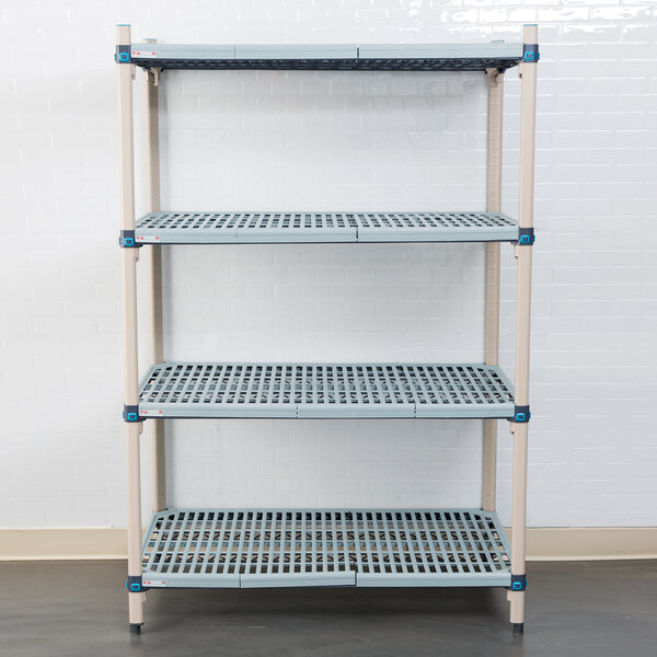 A white MetroMax Q shelving unit with three shelves.