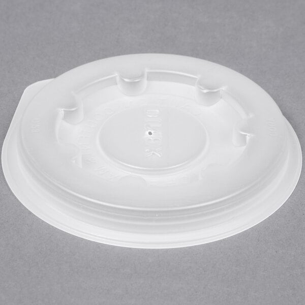A white plastic lid with a hole for a Dinex mug or bowl.