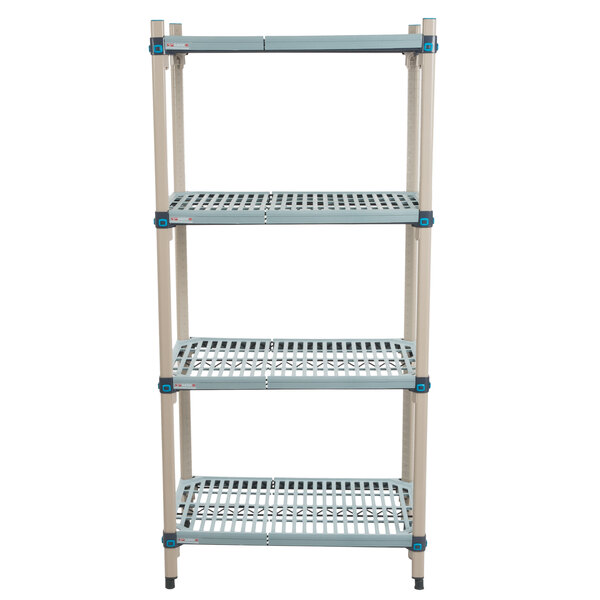 A white MetroMax Q shelving unit with four metal shelves and a white metal fence.