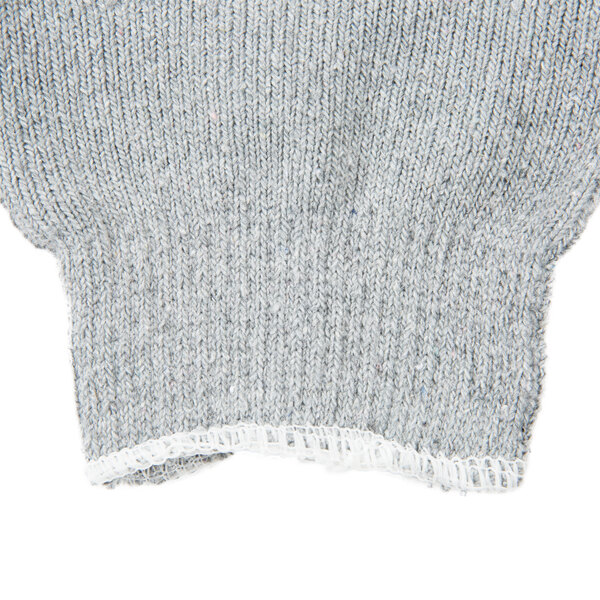 A close up of Cordova Loop-In gray work gloves with a white edge.