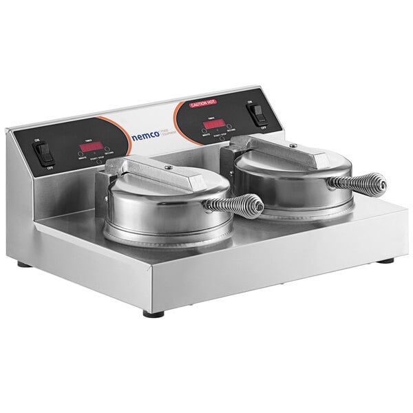 A Nemco dual waffle maker on a counter.