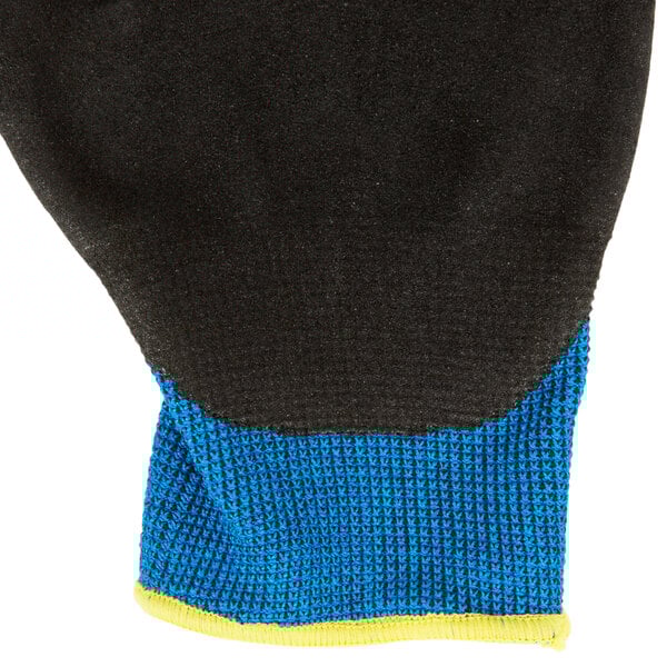 A pair of blue and black Cordova iON gloves with yellow trim.