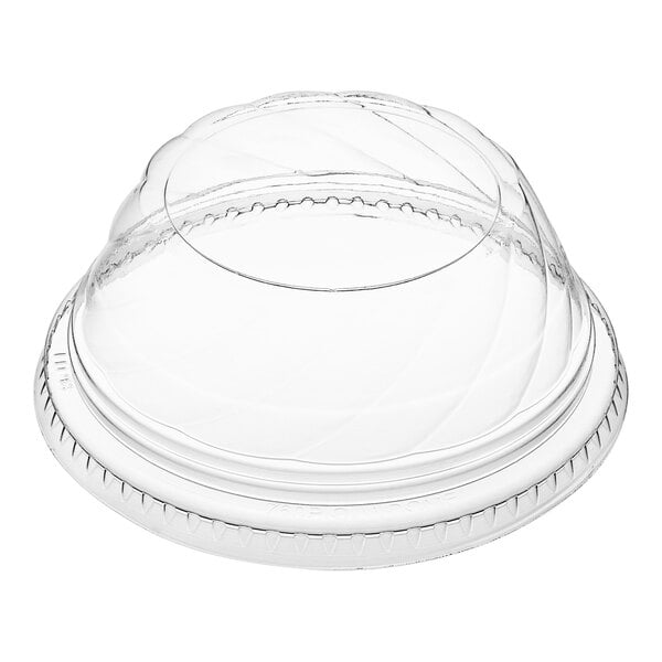 A clear plastic container with a low dome lid on top.