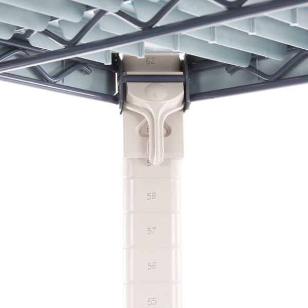 A white MetroMax Q shelving unit with blue accents.