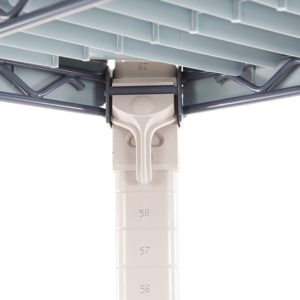 A close-up of a MetroMax Q metal pipe with a screw.