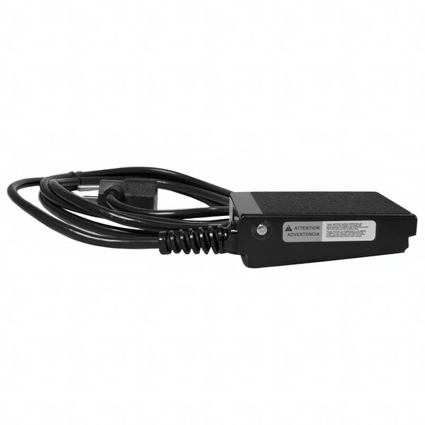 A black Crown Verity Pump-Saver foot switch pedal with a black spiral cable.