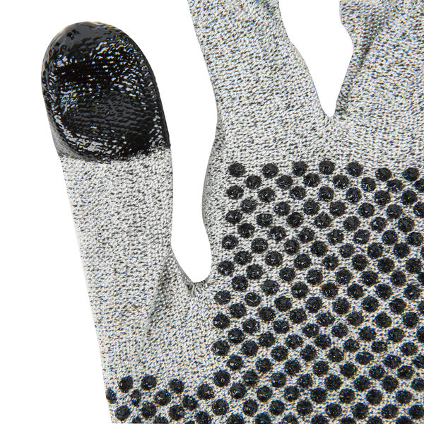 A close up of Cordova Monarch cut resistant gloves with black nitrile dots on them.