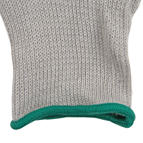 A Cordova Cor-Grip III glove with gray and green knit and green trim.