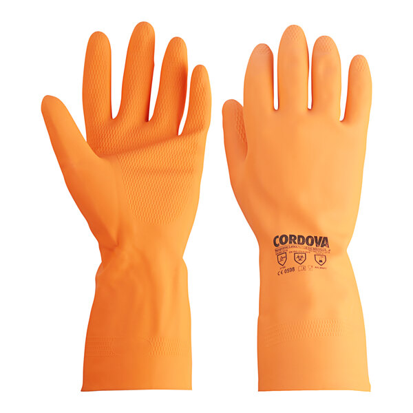 A close-up of a pair of orange Cordova rubber gloves with flock lining.