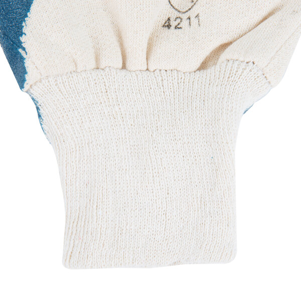 A pair of blue nitrile gloves with a blue and white logo on the wrist and a blue jersey lining.