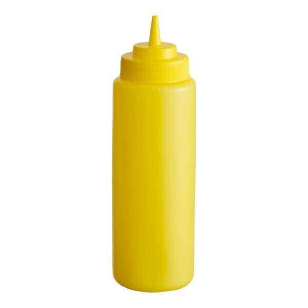 A yellow plastic squeeze bottle with a pointed nozzle and wide mouth, typically used for condiments.