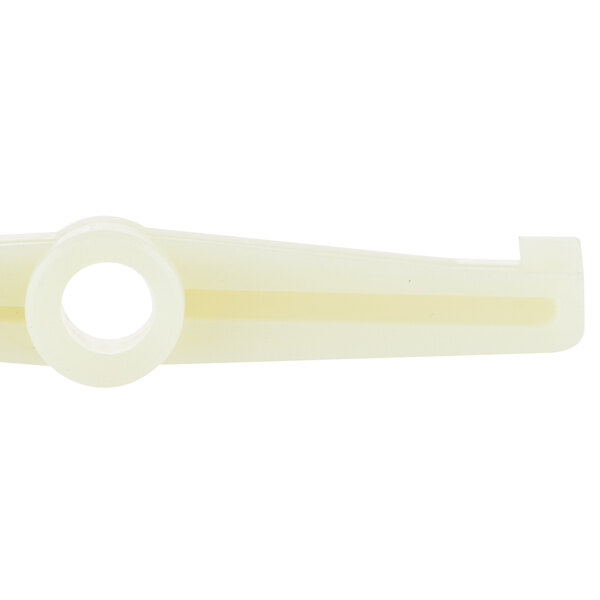 A white plastic switch handle with a hole.