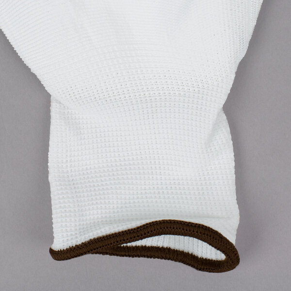 A pair of white nylon gloves with white polyurethane palm coating and brown trim.