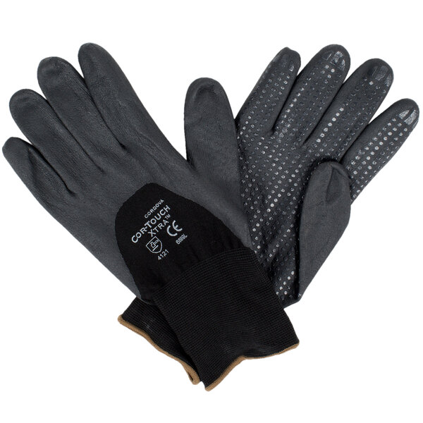 A pair of Cordova black work gloves with black and gray palm coating and nitrile dots.