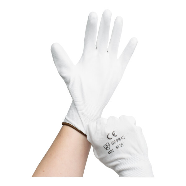 A pair of white polyester gloves with a white polyurethane palm coating being worn on hands.
