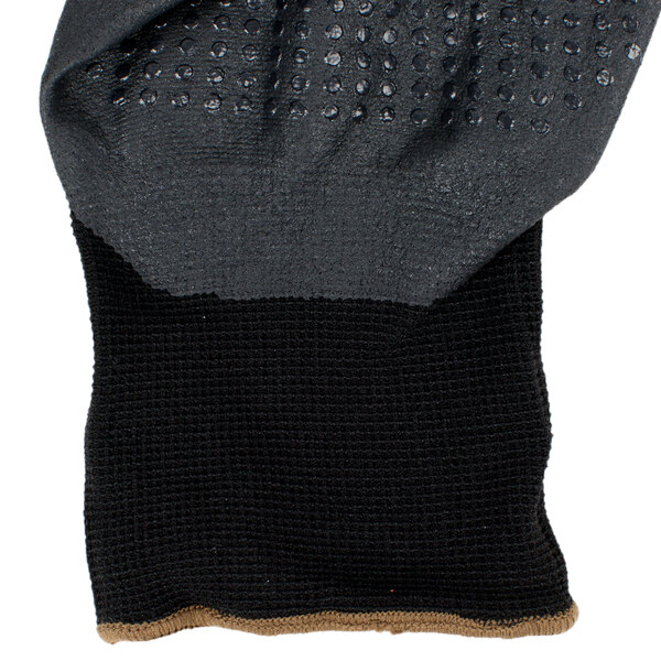 A black and gray Cordova Cor-Touch glove with black foam nitrile and nitrile dots.