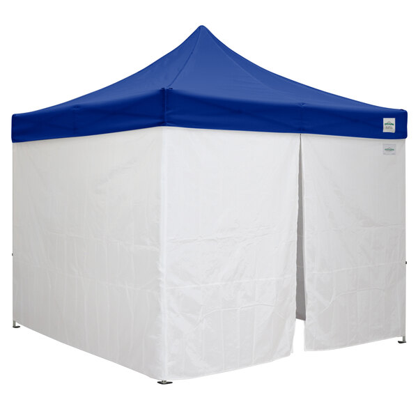 A blue Caravan Canopy with white walls on a white surface.