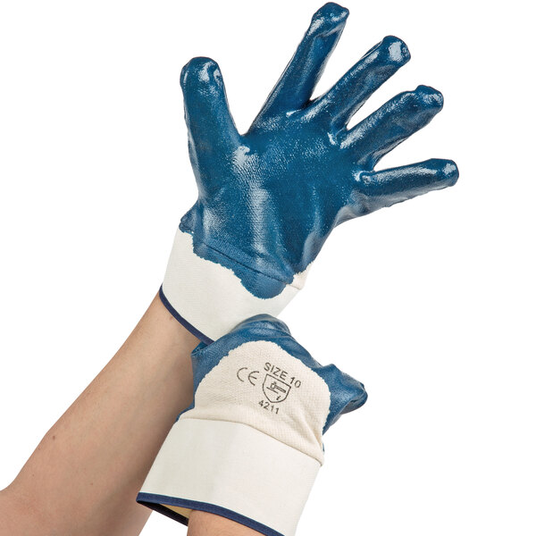 A pair of hands wearing blue Cordova smooth nitrile gloves with white jersey lining.