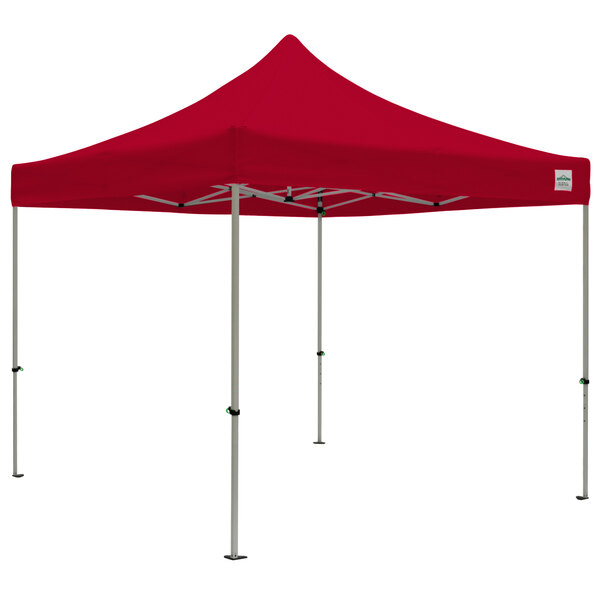 A red Caravan Canopy instant tent with poles.