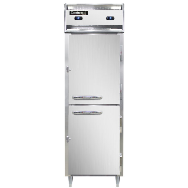 A white Continental reach-in refrigerator/freezer with two white doors with silver handles.