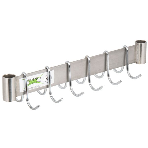 A stainless steel Regency pot rack with hooks.