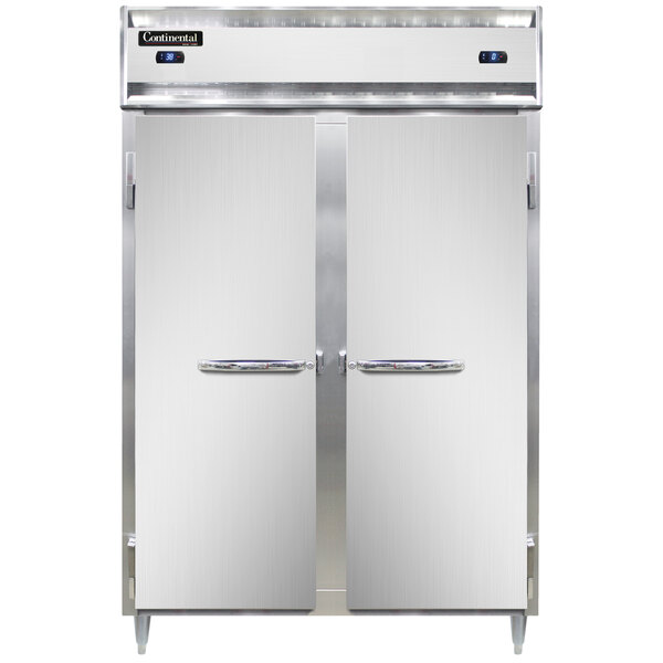 A white rectangular Continental DL2RF-SA refrigerator/freezer with two silver metal doors.