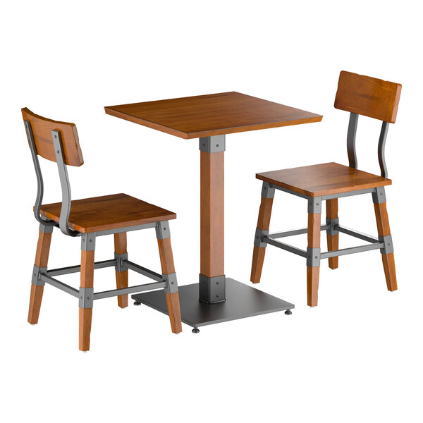 A wooden square table with a central pedestal base and two matching wooden chairs featuring metal accents and backrests.