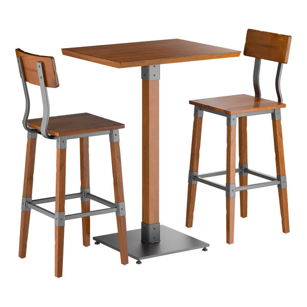 A bar-height table with a square wooden top and metal base, accompanied by two matching wooden bar stools with metal accents and backrests.