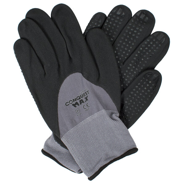 A pair of gray Cordova Conquest Max gloves with black and gray hand coatings and nitrile dots.