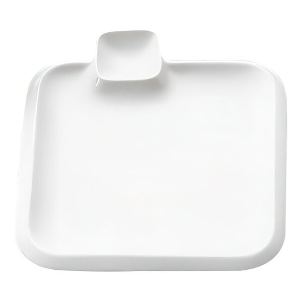 A white square porcelain plate with a square object on it.