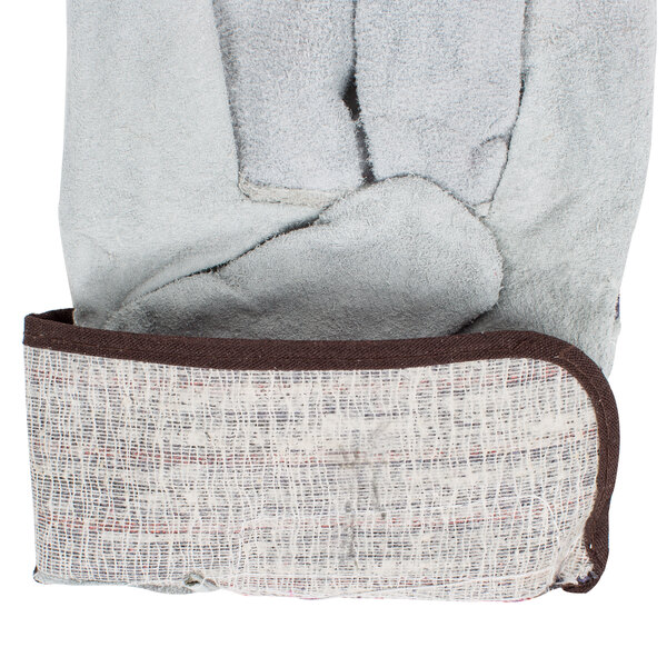 A pair of Cordova canvas work gloves with brown leather palms and cuffs.