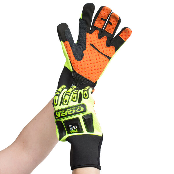 A pair of Cordova heavy duty work gloves with lime green spandex and orange synthetic leather.