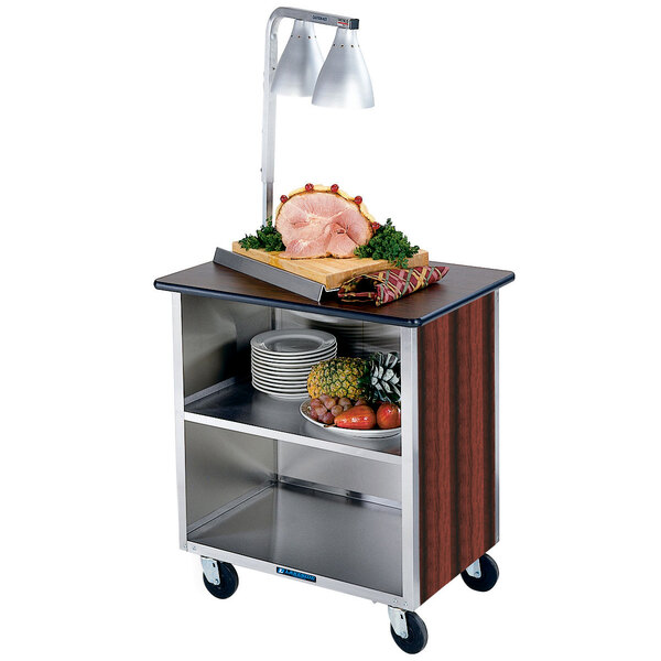 A Lakeside stainless steel utility cart with food on it.