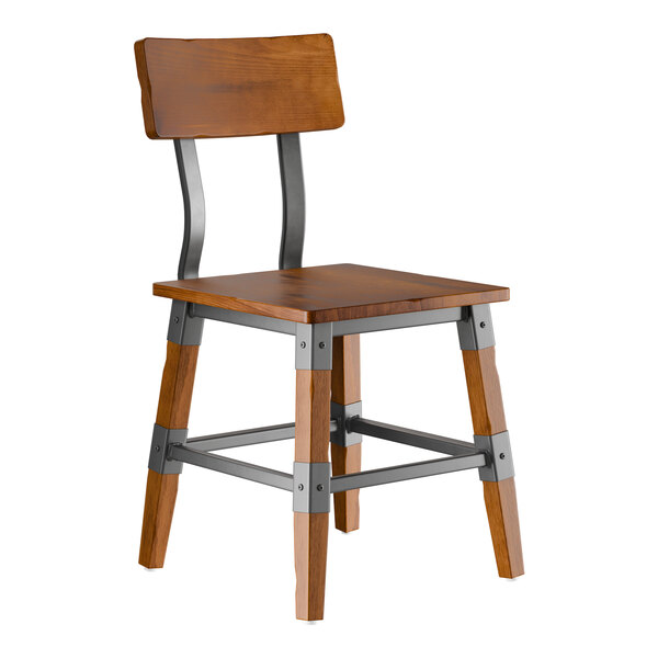 A wooden chair with a rustic walnut finish, metal supports, and a solid backrest.